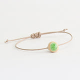 Recycled emerald green crackled glass ceramic circular bead light brown cord bracelet 