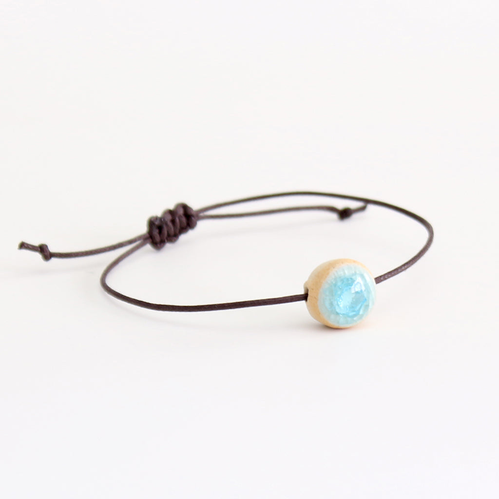 Recycled aqua blue crackled glass ceramic circular bead dark brown cord bracelet 