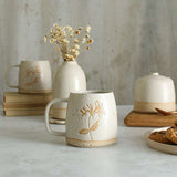 Honeysuckle mug in front of white ceramics table setting