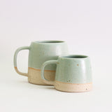 Small and large mint green stoneware mugs 