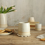 White scandi stoneware style mug in setting