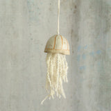 handmade jellyfish ceramic, ceramic shell decorated with a satin white glaze and tentacles made from a curly natural white wool - handmade in the UK by Habulous Ceramics