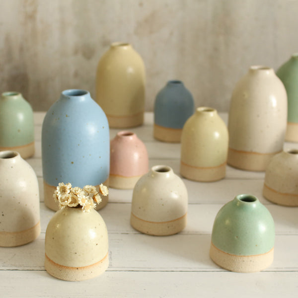 A variety of pastel bud vases in different sizes