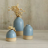 3 cornflower blue vases in different sizes