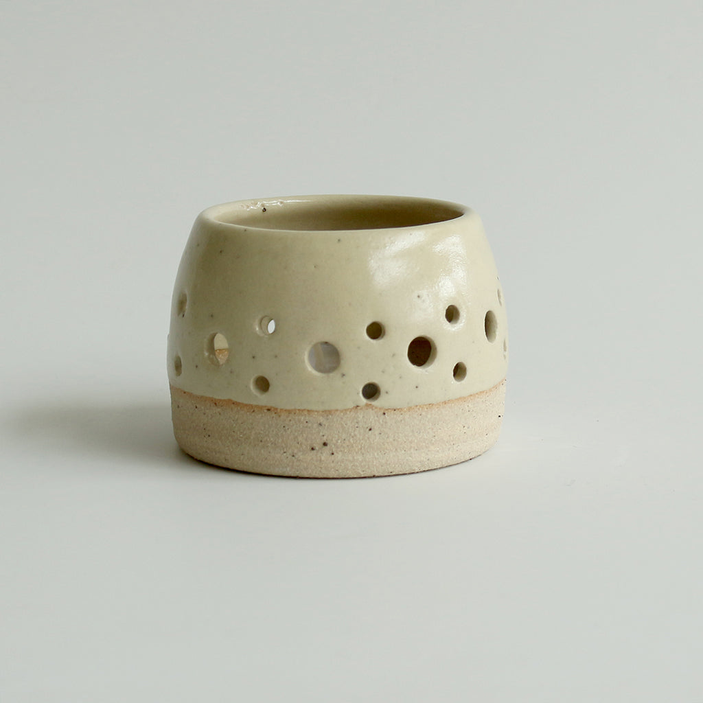 Light yellow ceramic tealight candle holder