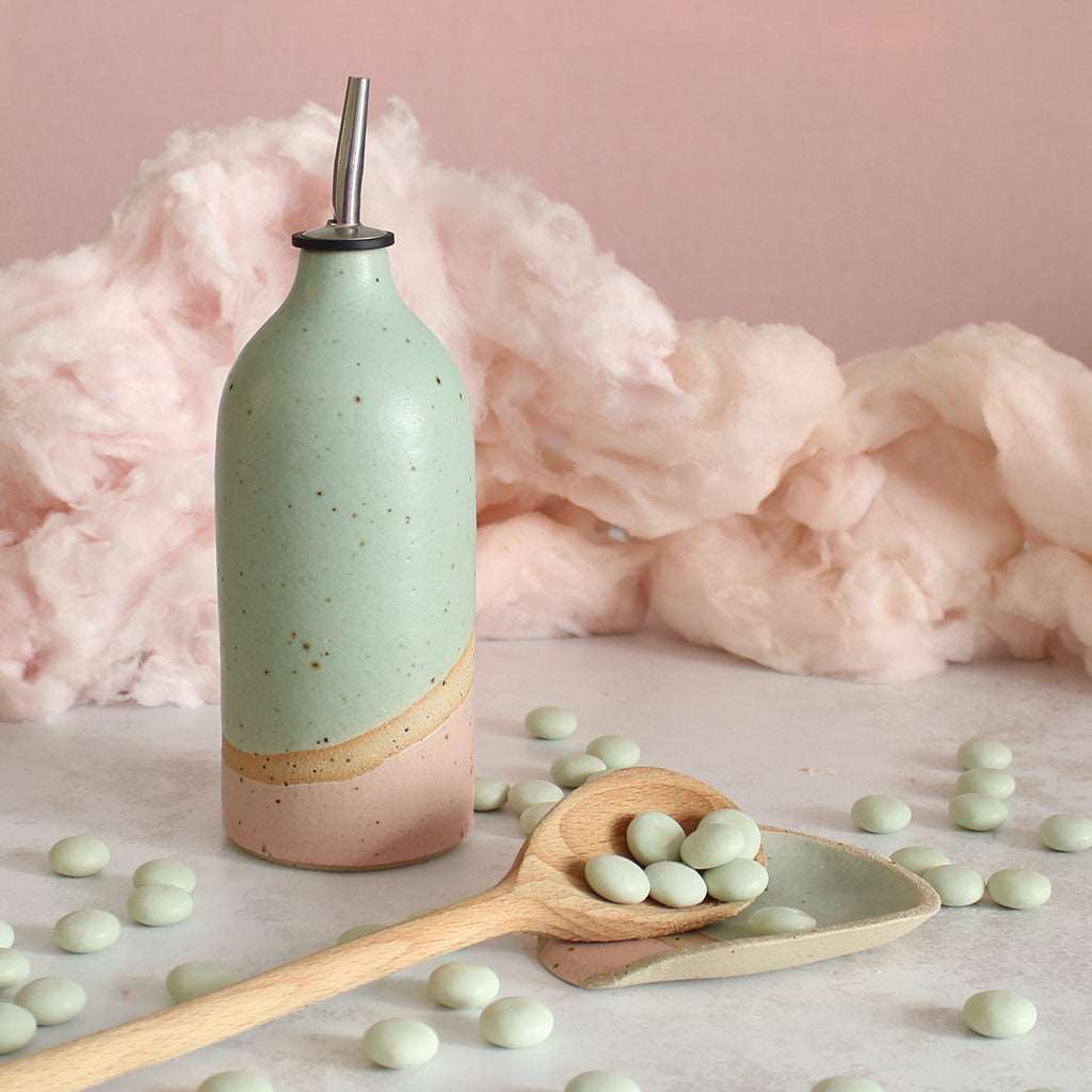 Cotton Candy spoon rest next to Cotton Candy oil pourer
