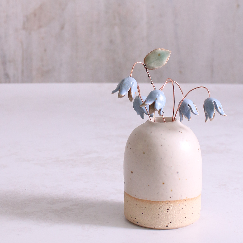 Pastel drop flower stems displayed in a handcrafted speckled vase – artisan home décor by Habulous.