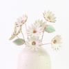 Ceramic daisy bouquet in a ceramic vase