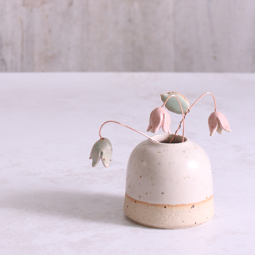 Pastel drop flower stems displayed in a handcrafted speckled vase – artisan home décor by Habulous.