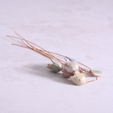 Close-up of pastel ceramic flower stems with copper wire stems – individually handcrafted floral home accessories from Habulous
