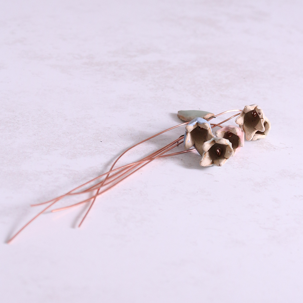 Close-up of pastel ceramic flower stems with copper wire stems – individually handcrafted floral home accessories from Habulous