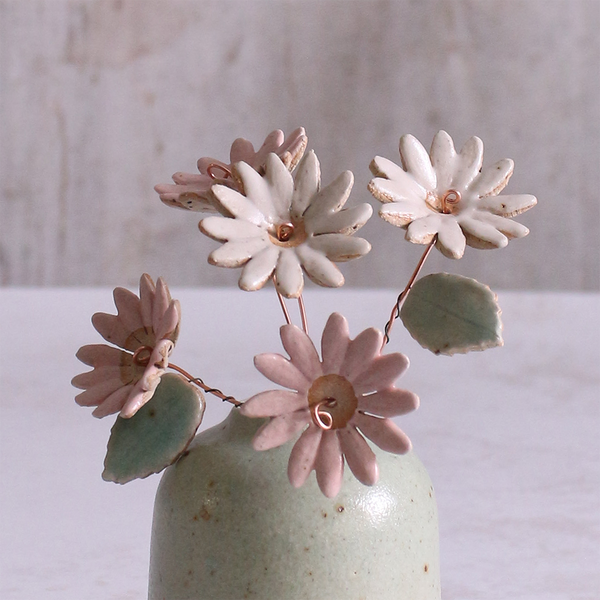 Handcrafted ceramic large pink and white  flower stems with soft glazes displayed in an off-white vase. Each flower features a flexible copper wire stem for easy adjustment.