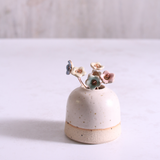 Pastel ceramic flower stems displayed in a handcrafted  ceramic vase – artisan home décor by Habulous