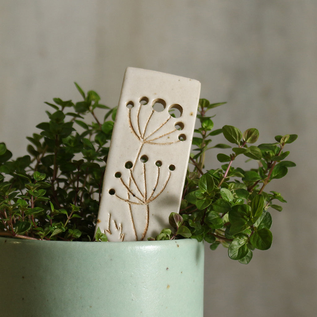 Close up of plant marker in plant pot