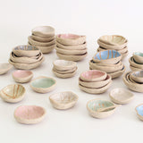 Stacks of all wonky bowl sizes and colours