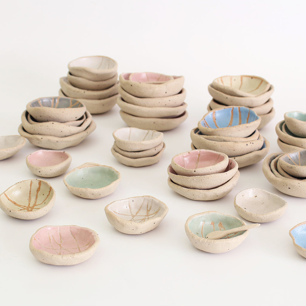 Stacks of all wonky bowl sizes and colours