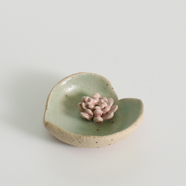 Lily Pad Ceramic incense holder on a plain white background.