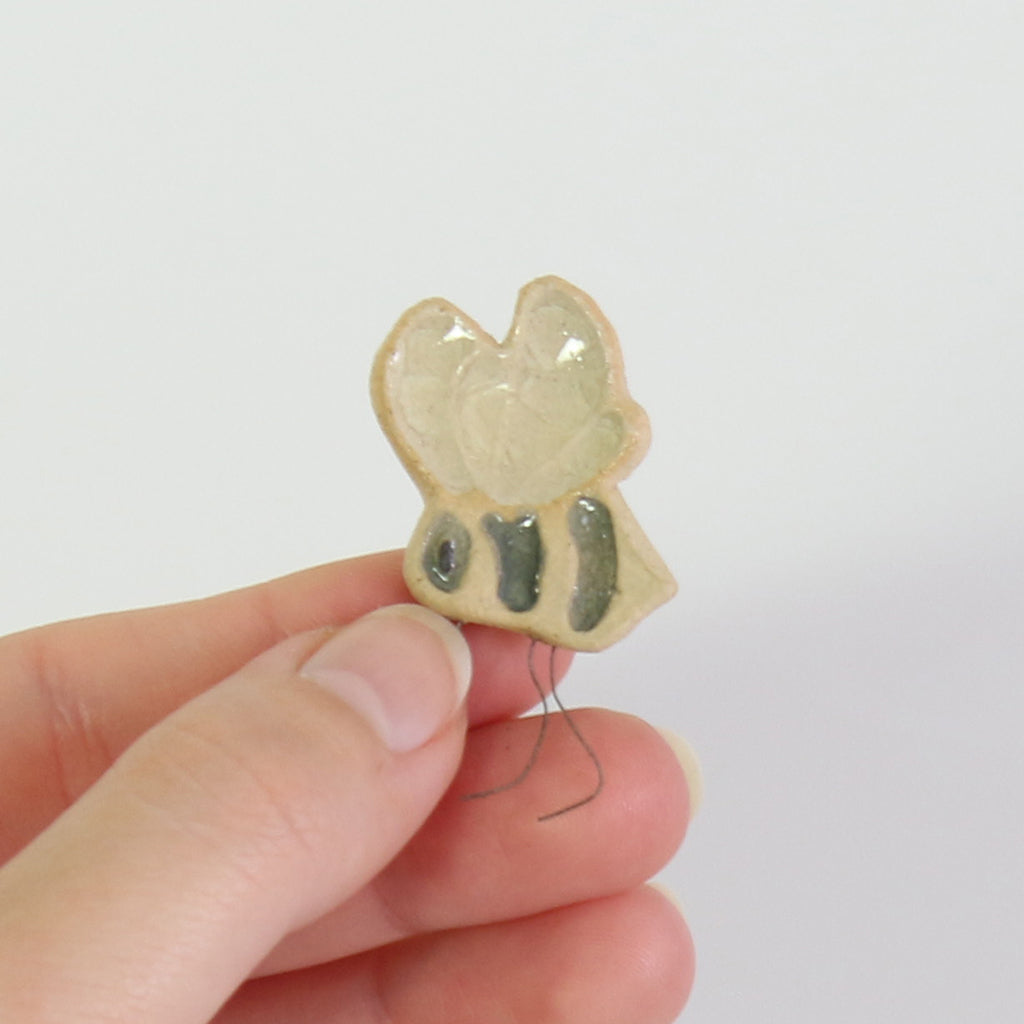 small ceramic and glass bumble bee plant decoration