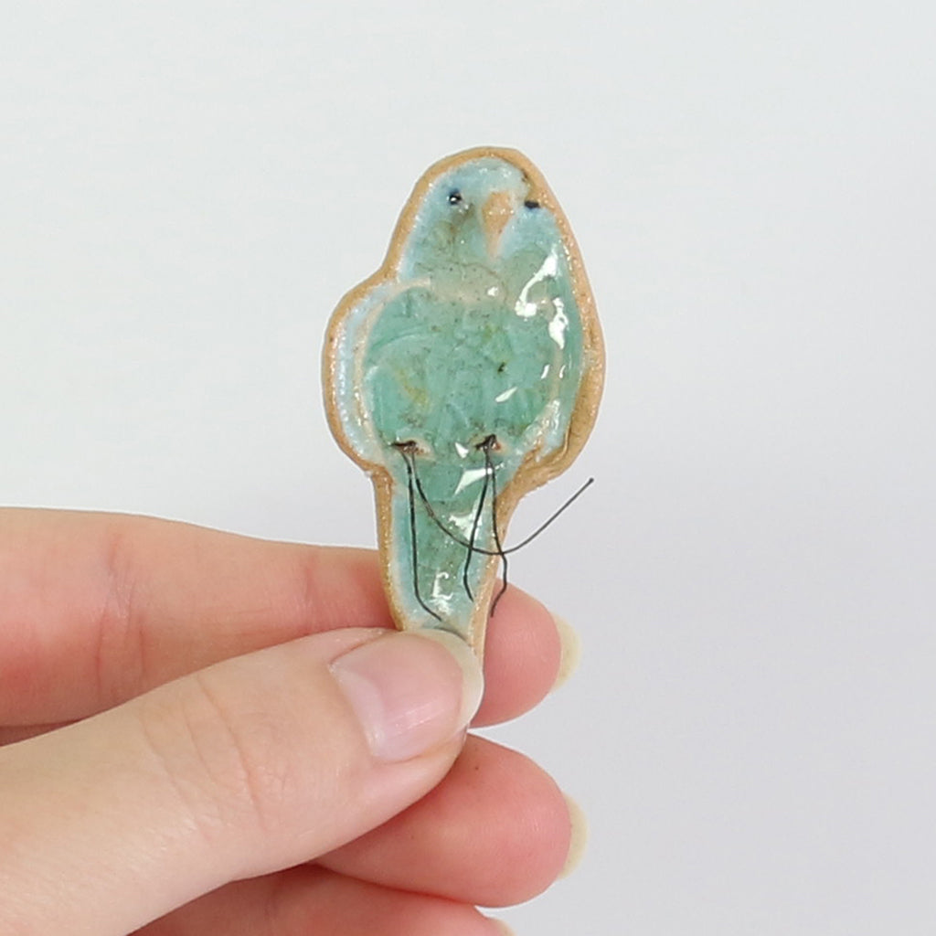 small ceramic and glass aqua blue budgie plant decoration