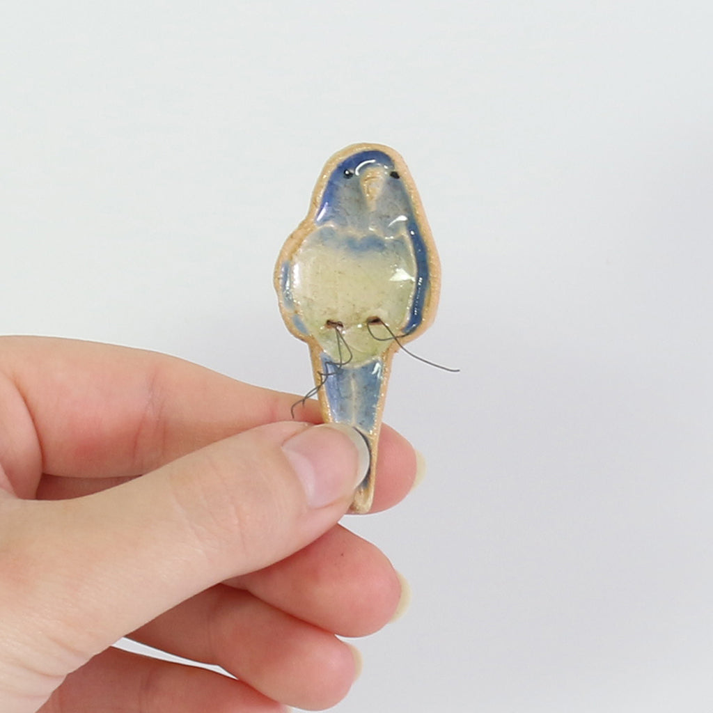 small ceramic and glass dark blue budgie plant decoration