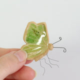 small ceramic and glass emerald green butterfly plant decoration