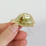 small ceramic and glass brown tortoise plant decoration