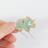 small ceramic and glass aqua blue triceratops dinosaur plant decoration