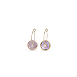 Pair of gold hoop earrings with pink circular charms on a white background