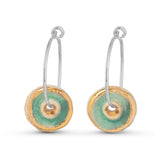 Emerald green glass circular sterling silver small hoop earrings outlined in gold lustre
