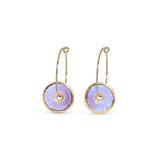 Pair of gold hoop earrings with opal circular discs on a white background