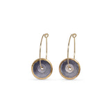 Pair of earrings with gold hoops and circular purple discs on a white background