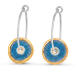 Blue glass circular sterling silver large hoop earrings outlined in gold lustre