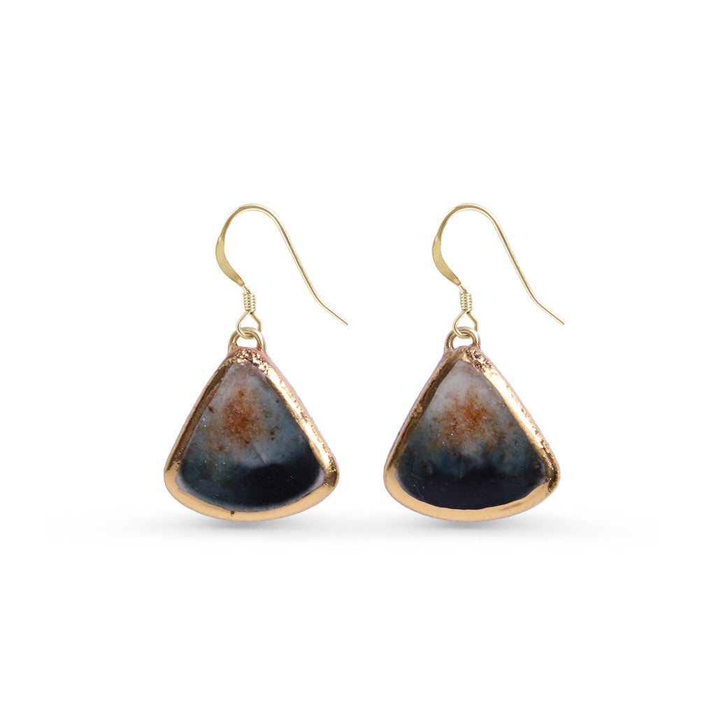 Pair of gold-edge triangular earrings on a white background