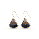 Pair of gold-edge triangular earrings on a white background