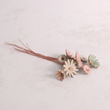 Handcrafted ceramic flower bouquet, featuring delicate pink and white wildflowers with green leaves, arranged with copper wire stems — perfect for rustic home decor.