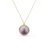 Necklace with a round purple pendant on a gold chain against a white background