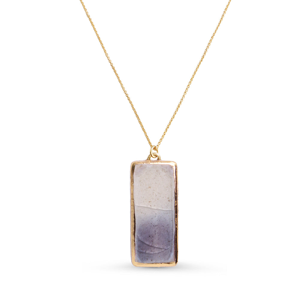Necklace with a rectangular pendant on a white background