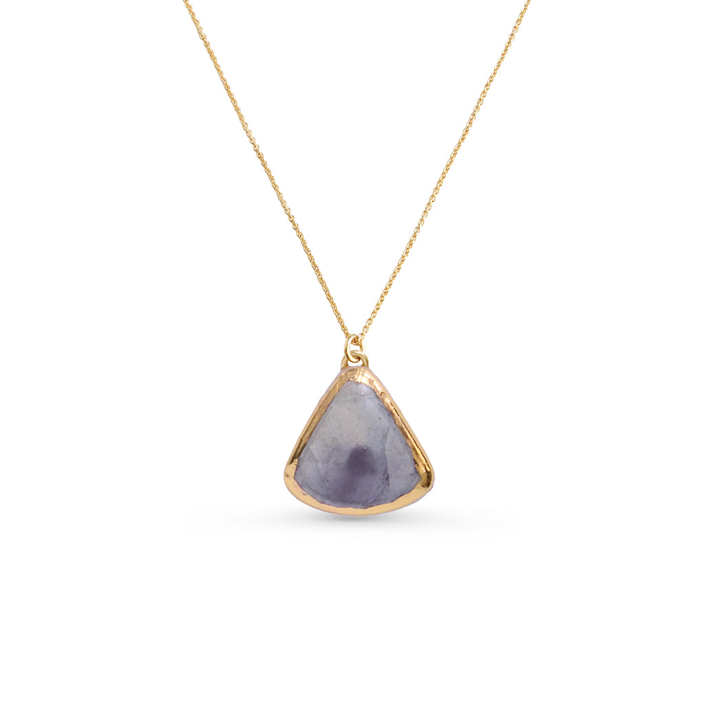 Necklace with a gold pendant featuring a purple element on a white background