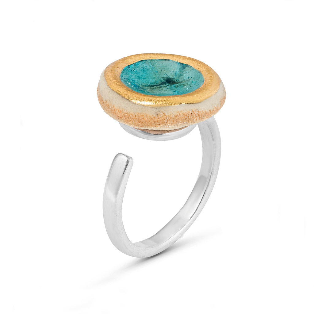 Side view of turquoise reef glass small round sterling silver adjustable ring gold lustre