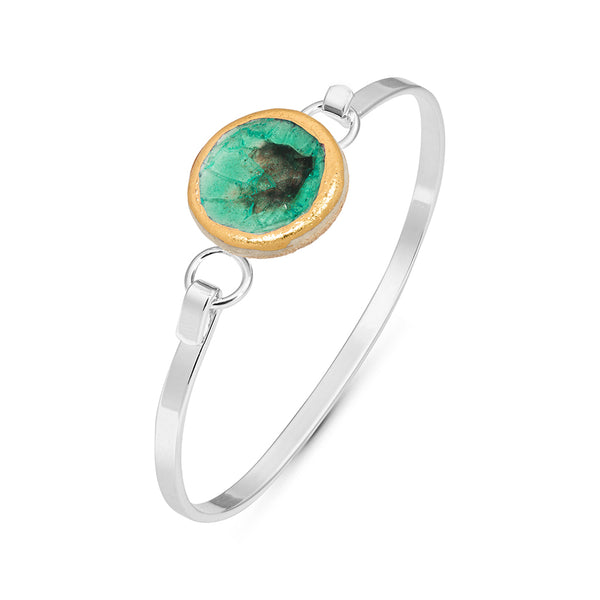 Side view of emerald green crackled glass round charm outlined in gold lustre on a silver plated latch bangle
