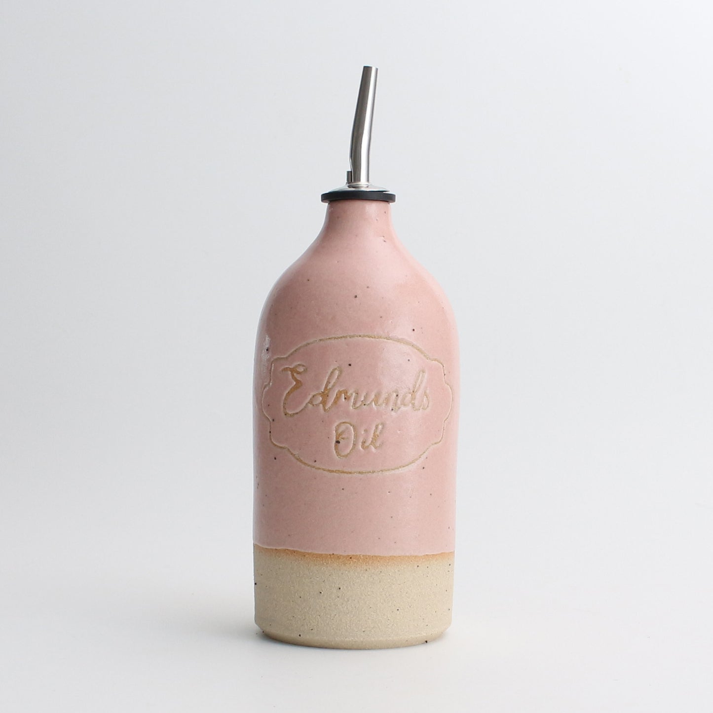 Personalised pink 'Edmunds Oil' example stoneware pourer