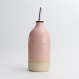 Personalised pink 'Edmunds Oil' example stoneware pourer