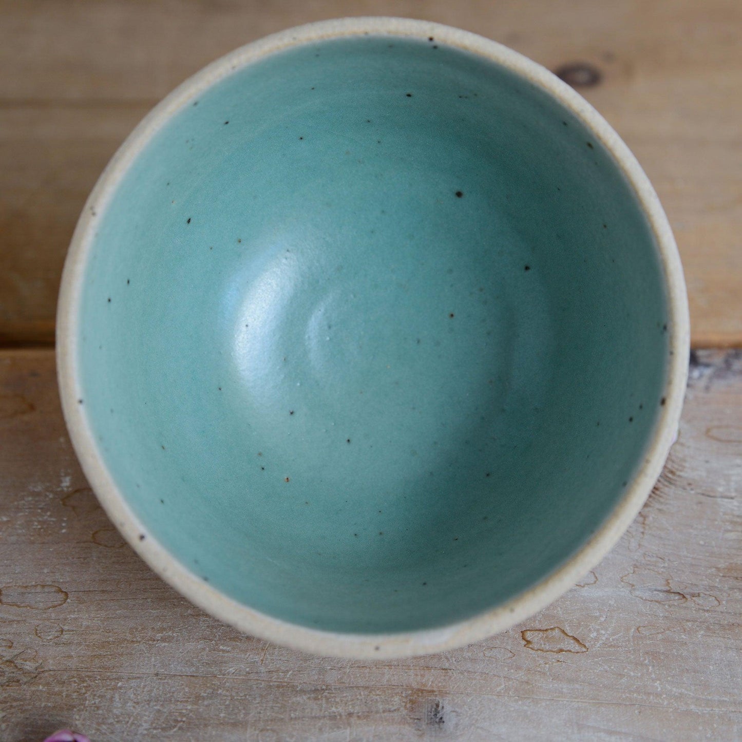 Close up of mint green glaze inside bowl