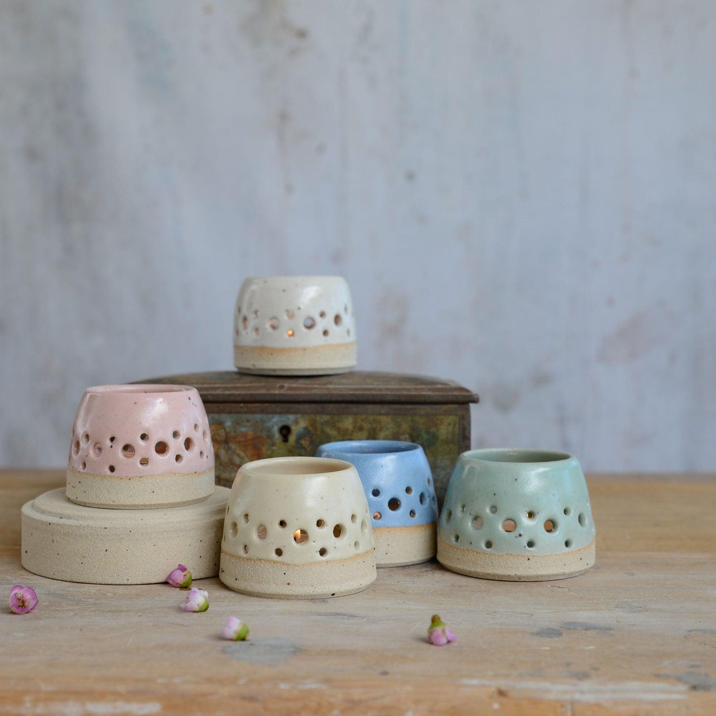 All five pastel coloured tealight holders on different levels