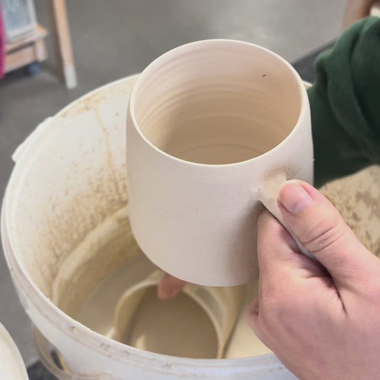 Video showing the process of glazing our birth flower mugs