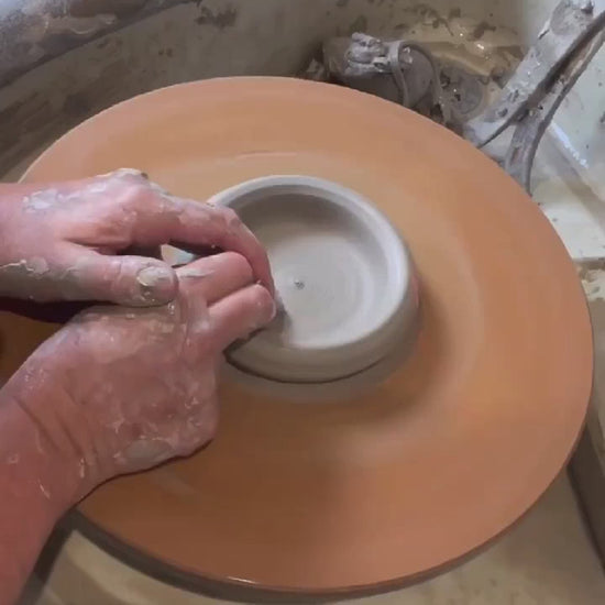 Video showing the process of hand throwing and finishing our ceramic mugs