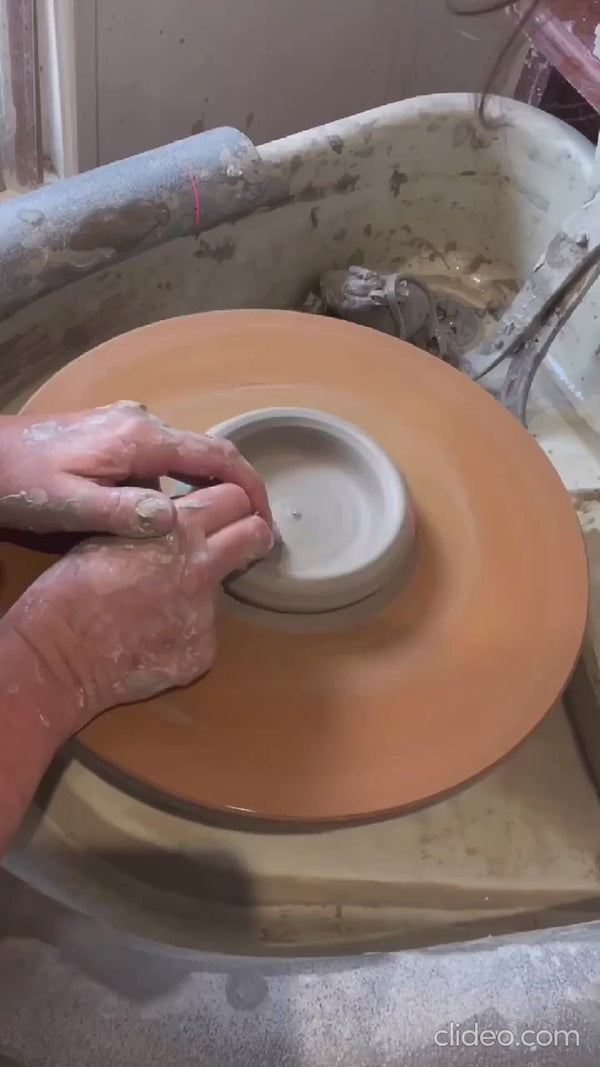Video showing the process of hand throwing and finishing our ceramic mugs