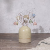 Pastel drop flower stems displayed in a handcrafted speckled vase – artisan home décor by Habulous.