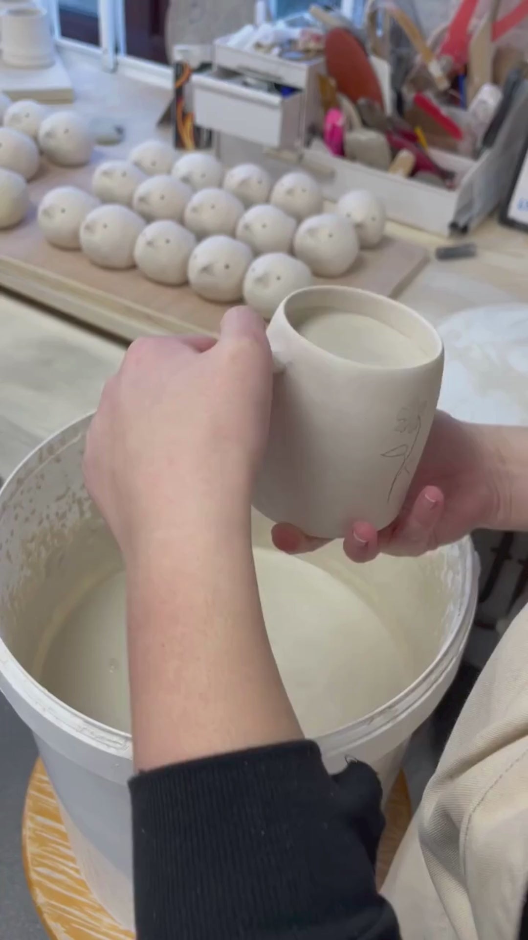 Video showing the process of glazing our birth flower mugs