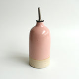 Large pink stoneware oil pourer